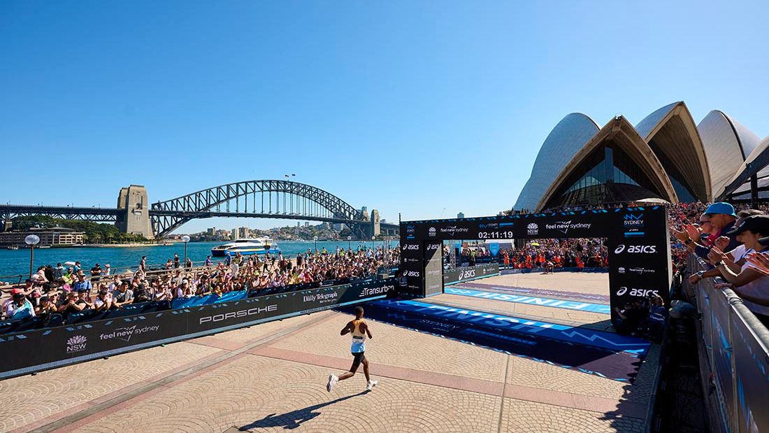 Marathoner running to the Sydney Opera House finish line.